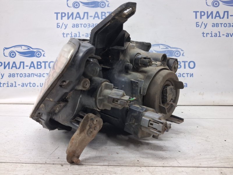 Фара левая галоген L200 2006-2015 KB 2.5 Diesel 4D56