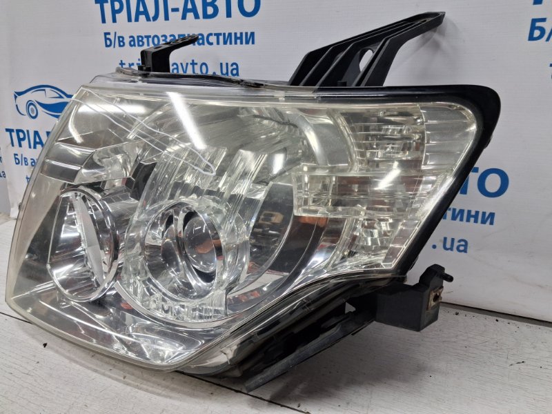 Фара левая галоген Mitsubishi Pajero Wagon 4 3.2 Дизель 4M41
