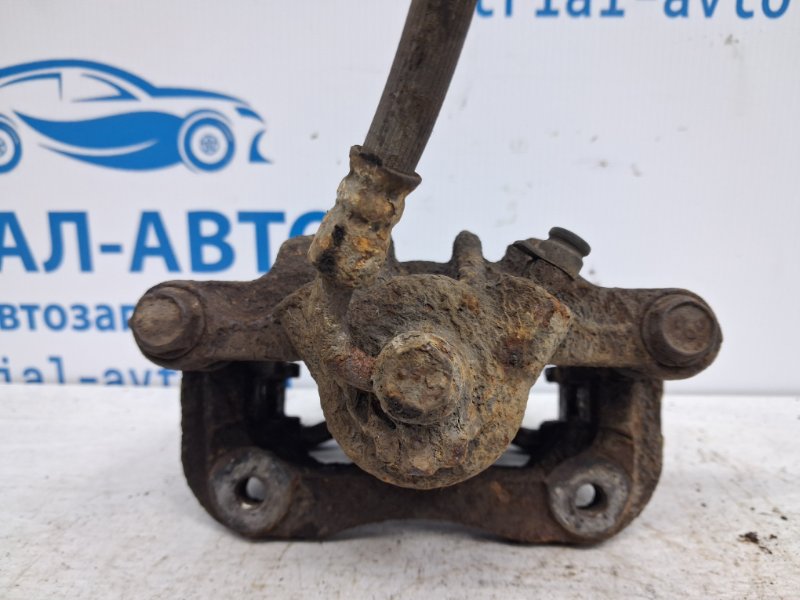 Суппорт задний левый SsangYong Korando C200 2.0 diesel D20Dt