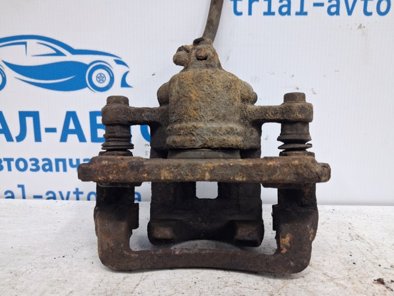 Суппорт задний левый Korando 2010-2019 C200 2.0 diesel D20Dt