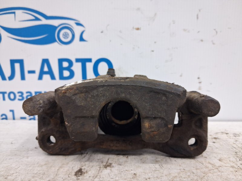 Суппорт задний левый Outlander 2003-2006 cu 2.4 бензин 4G69