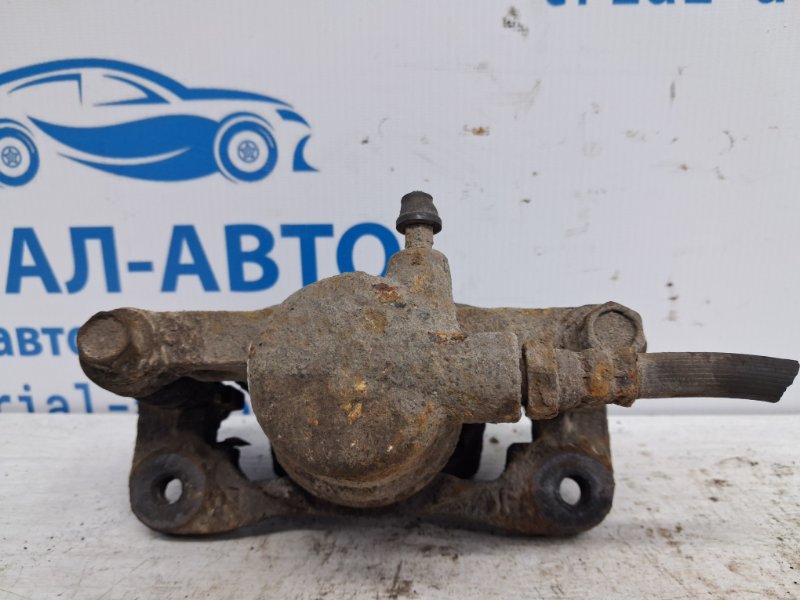 Суппорт задний левый Mitsubishi Outlander cu 2.4 бензин 4G69