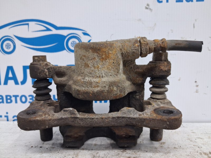 Суппорт задний левый Outlander 2003-2006 cu 2.4 бензин 4G69