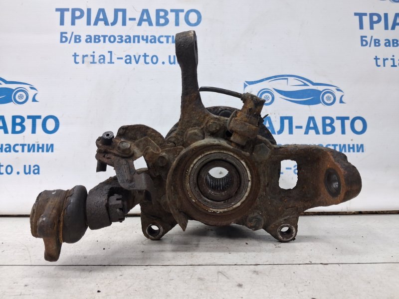 Кулак поворотный левый со ступицей Mitsubishi L200 2006-2015 KB 2.5 Diesel 4D56 MR992377 Б/У