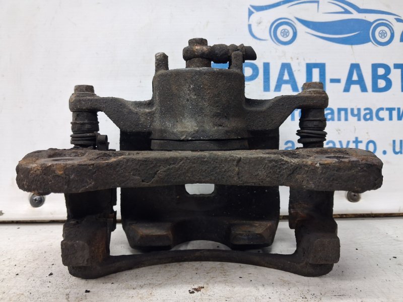 Суппорт передний левый L200 2006-2015 KB 2.5 Diesel 4D56