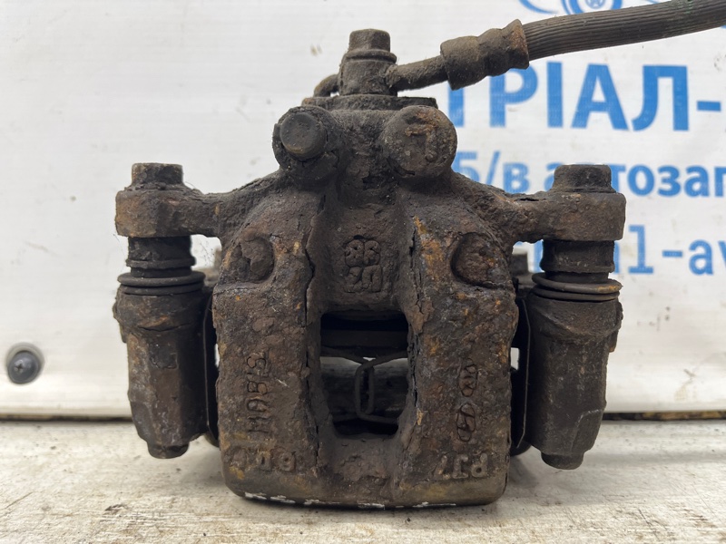 Суппорт задний левый Kia Sportage 2015-2022 QL 1.7 diesel D4FD 58210D7000 Б/У