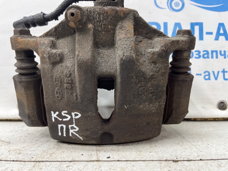 Запчасть суппорт передний правый Kia Sportage 2010-2016 SL 1.7 diesel D4FD 581302Y000 Б/У Суппорт передний правый Kia Sportage 2010-2016 SL 1.7 diesel D4FD 581302Y000 Б/У