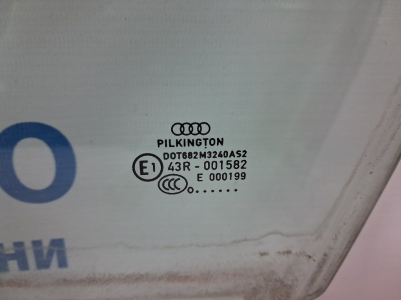Стекло двери переднее левое