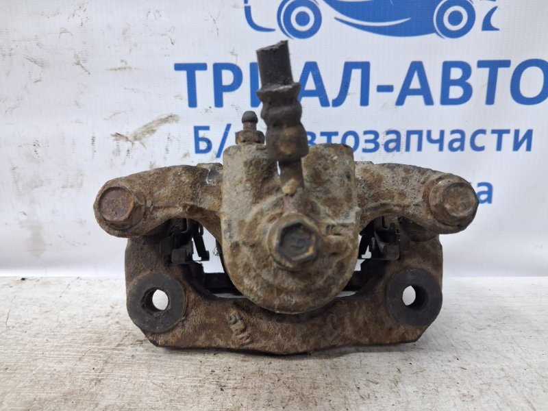 Суппорт задний левый Nissan Pathfinder R51 2.5 Diesel YD25DDTI