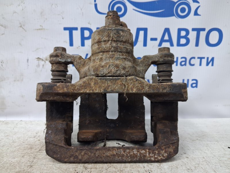 Суппорт задний левый Pathfinder 2004-2014 R51 2.5 Diesel YD25DDTI