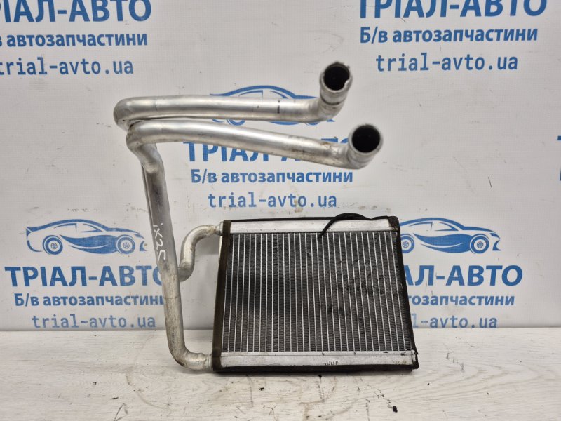 Запчасть радиатор печки Hyundai IX35 2009-2015 LM 1.7 diesel D4FD 971382Y500 Б/У Радиатор печки Hyundai IX35 2009-2015 LM 1.7 diesel D4FD 971382Y500 Б/У