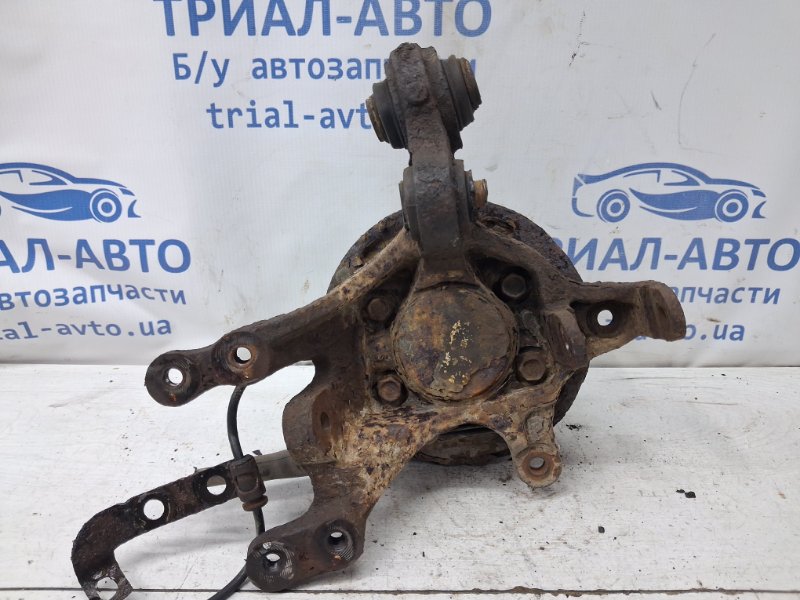 Запчасть цапфа задняя левая со ступицей Kia Ceed 2006-2012 ED 1.6 diesel D4FB 527101H000 Б/У Цапфа задняя левая со ступицей Kia Ceed 2006-2012 ED 1.6 diesel D4FB 527101H000 Б/У