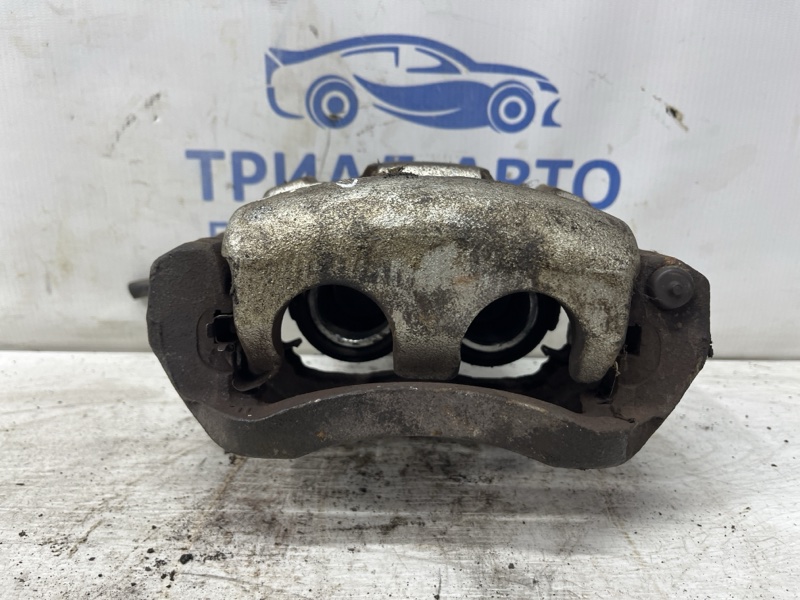 Запчасть суппорт передний правый Mazda CX 7 2006-2012 ER 2.2 дизель MZR-CD L23233980F Б/У Суппорт передний правый Mazda CX 7 2006-2012 ER 2.2 дизель MZR-CD L23233980F Б/У