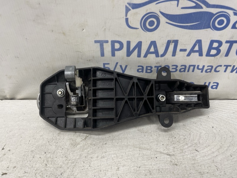 Ручка двери внешняя задняя левая Mazda CX 7 ER 2.2 дизель MZR-CD Ручка двери внешняя задняя левая Mazda CX 7 ER 2.2 дизель MZR-CD