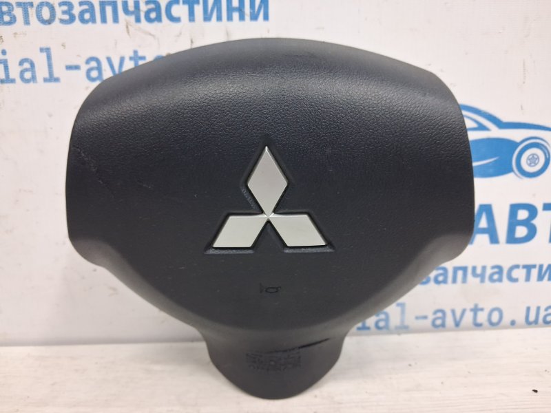 Запчасть подушка безопасности в руль Mitsubishi Outlander 2007-2012 XL 2.2 diesel 4N14 7030A332XA Б/У Подушка безопасности в руль Mitsubishi Outlander 2007-2012 XL 2.2 diesel 4N14 7030A332XA Б/У