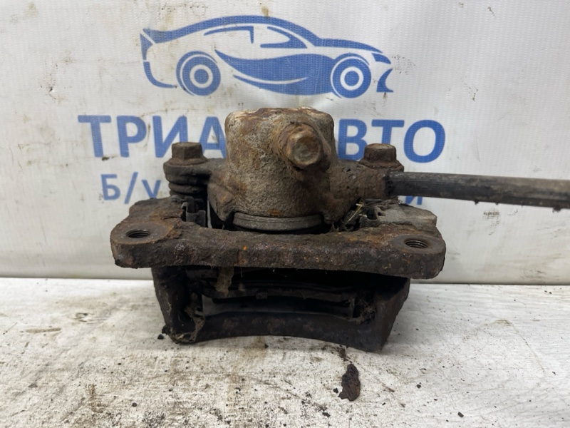 Суппорт задний левый Toyota Prado J120 3.0 Diesel 1KDFTV Суппорт задний левый Toyota Prado J120 3.0 Diesel 1KDFTV