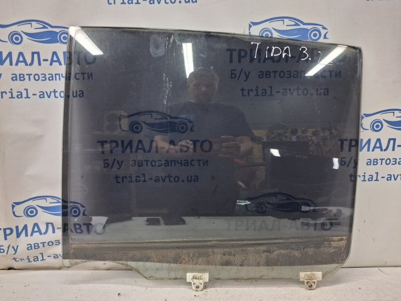 Запчасть стекло двери заднее левое Nissan Tiida 2004-2014 C11 1.6 Бензин HR16 82301EL000 Б/У Стекло двери заднее левое Nissan Tiida 2004-2014 C11 1.6 Бензин HR16 82301EL000 Б/У