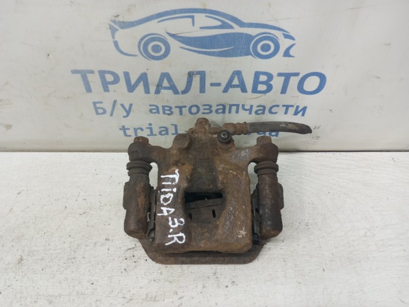 Запчасть суппорт задний правый Nissan Tiida 2004-2014 C11 1.6 Бензин HR16 44001EM11A Б/У Суппорт задний правый Nissan Tiida 2004-2014 C11 1.6 Бензин HR16 44001EM11A Б/У
