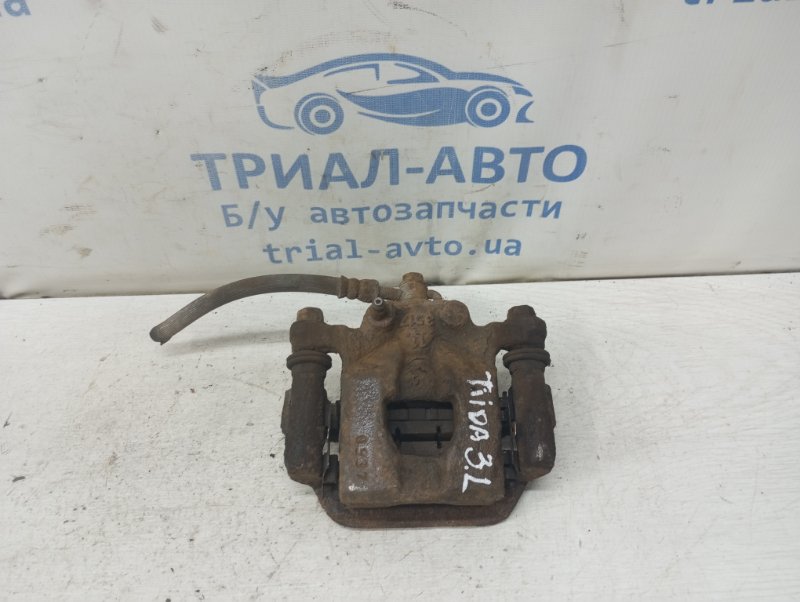 Запчасть суппорт задний левый Nissan Tiida 2004-2014 C11 1.6 Бензин HR16 44011EM11A Б/У Суппорт задний левый Nissan Tiida 2004-2014 C11 1.6 Бензин HR16 44011EM11A Б/У