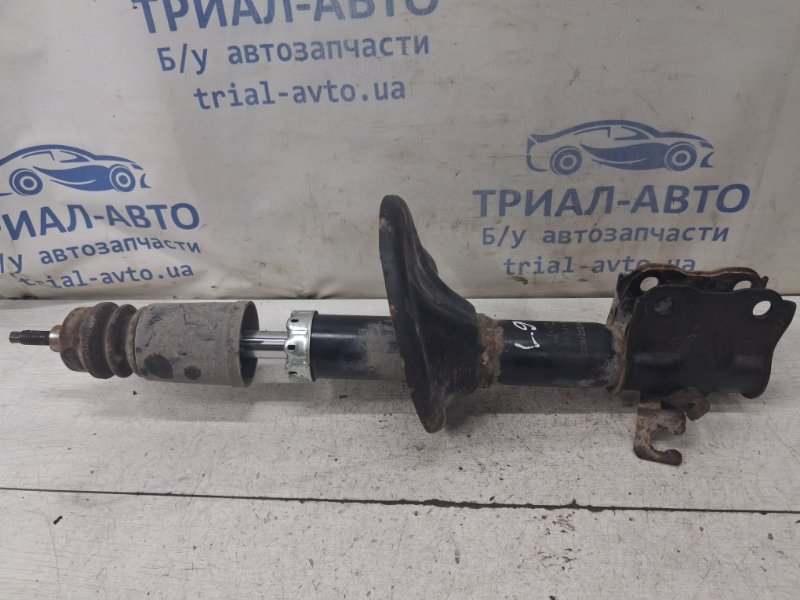 Амортизатор передний левый Lancer 2003-2009 9 1.6 бензин 4G18