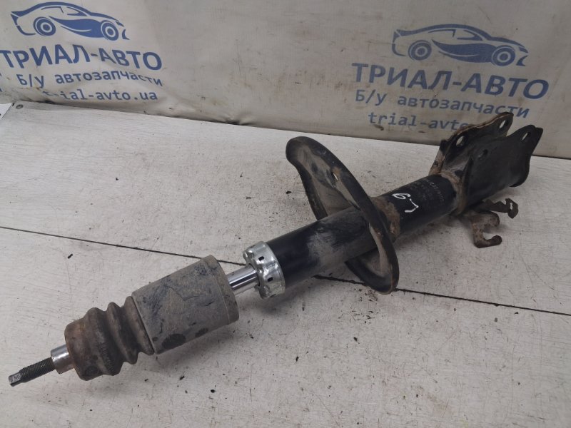 Амортизатор передний левый Lancer 2003-2009 9 1.6 бензин 4G18