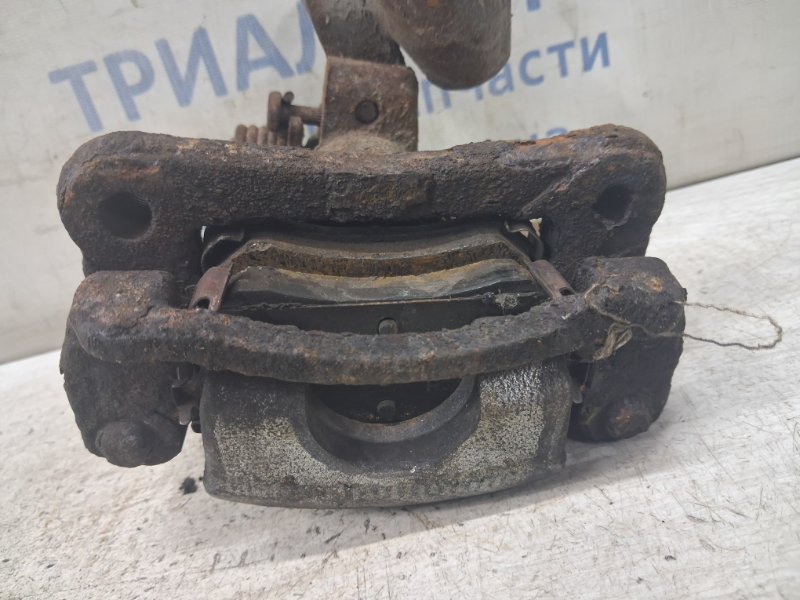 Суппорт задний левый Picanto 2003-2011 FL 1.1 Суппорт задний левый Picanto 2003-2011 FL 1.1