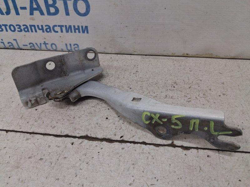 Запчасть петля капота левая Mazda CX 5 2011-2017 KE 2.2 diesel KD5352420 Б/У Петля капота левая Mazda CX 5 2011-2017 KE 2.2 diesel KD5352420 Б/У