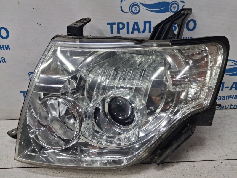 Запчасть фара левая ксенон Mitsubishi Pajero Wagon 2006-2022 4 3.2 Дизель 4M41 8301A915 Б/У Фара левая Ксенон Mitsubishi Pajero Wagon 2006-2022 4 3.2 Дизель 4M41 8301A915 Б/У