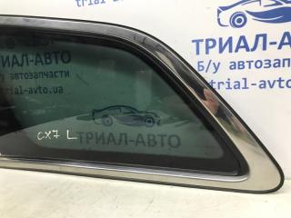 Стекло в кузов заднее левое Mazda CX 7 ER 2.3 бензин L3VDT Стекло в кузов заднее левое Mazda CX 7 ER 2.3 бензин L3VDT
