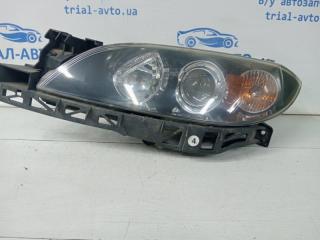 Фара левая Mazda 3 2003-2009