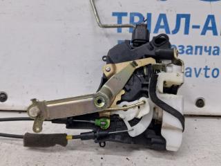 Замок двери передний левый Mitsubishi L200 KB 2.5 Diesel 4D56