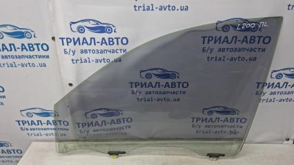 Стекло двери переднее левое Mitsubishi L200 2006-2015