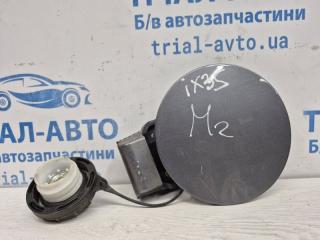 Фото запчасти лючок бака Hyundai IX35 2009-2015 Б/У запчасть Запчасть лючок бака Hyundai IX35 2009-2015